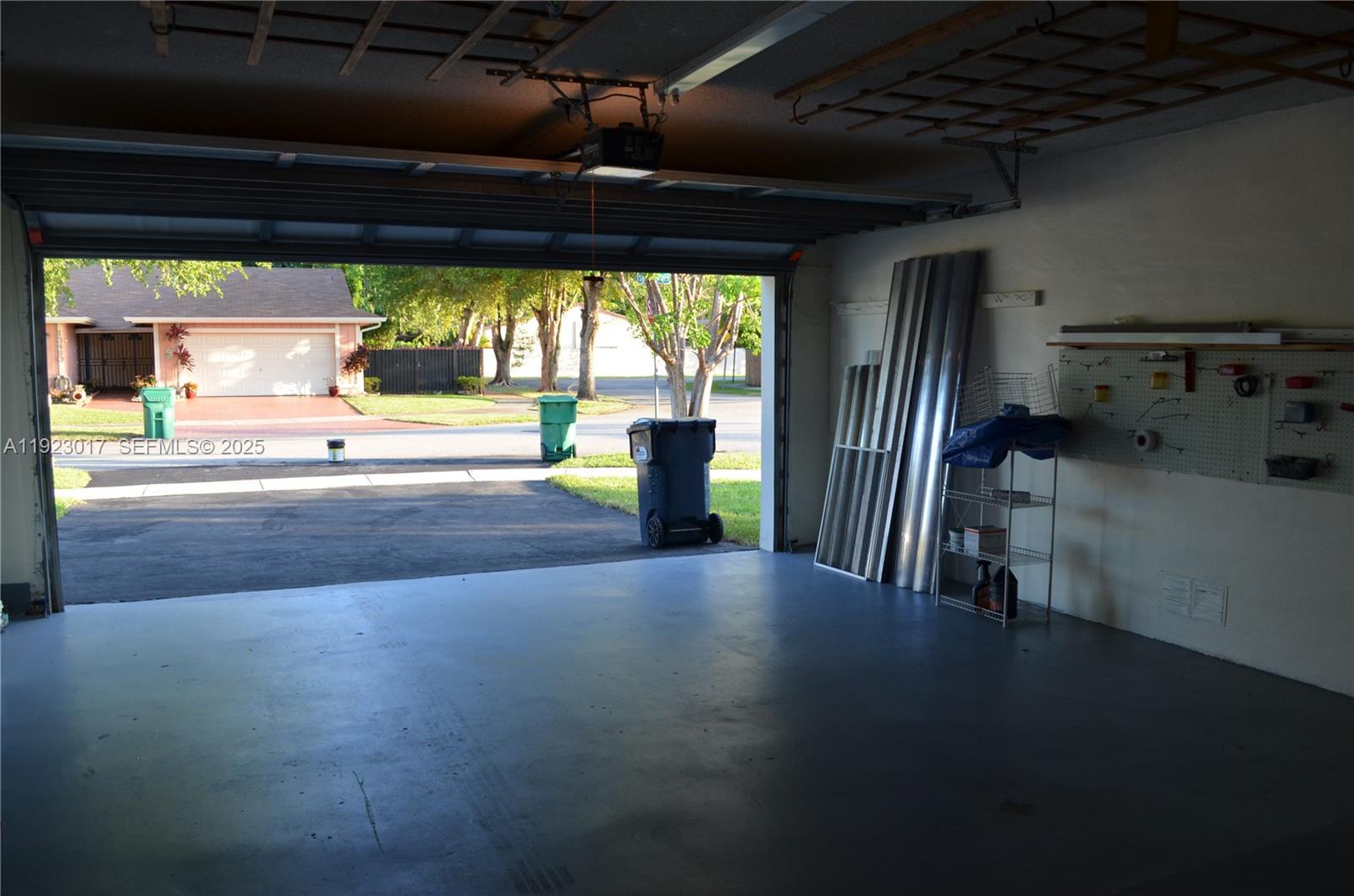 13491 Southwest 99th Terrace Miami, FL 33186 - Photo 37 of 41 a view of an empty room with a fireplace