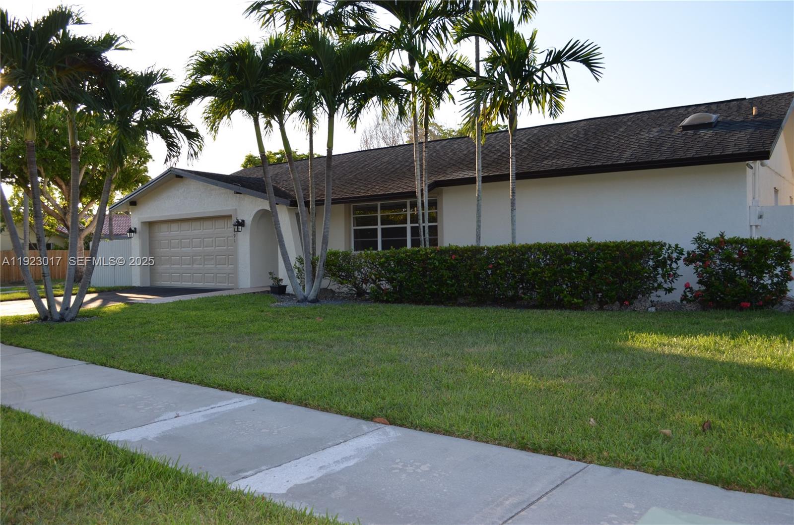 13491 Southwest 99th Terrace Miami, FL 33186 - Photo 40 of 41 a view of a house with a garden