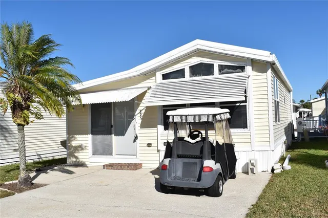 a car parked in front of a house