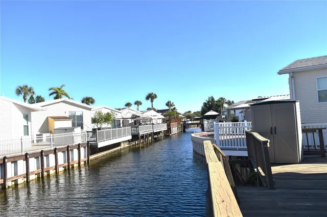a view of a balcony with chairs