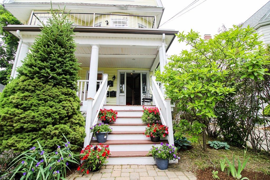 a front view of a house with a porch