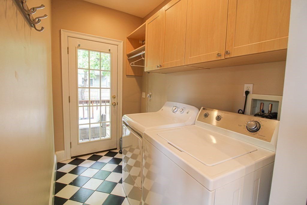 10 Marlboro Street, Unit 1 Belmont, MA 02478 - Photo 14 of 20 a utility room with dryer and washer