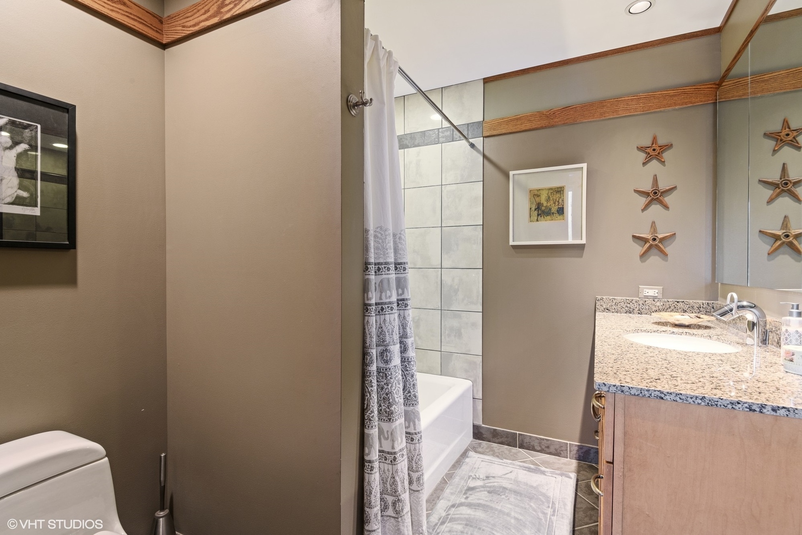 937 Keystone Avenue River Forest, IL 60305 - Photo 22 of 32 a bathroom with a granite countertop sink a toilet and shower