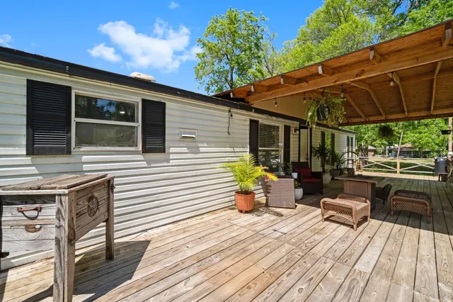 a view of a two chairs on the deck
