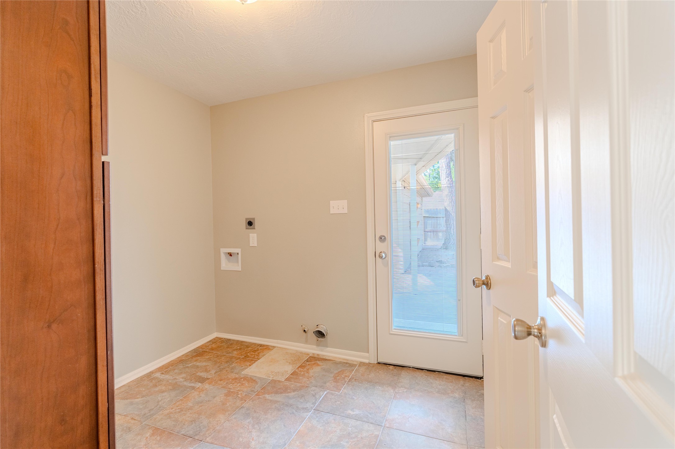 5938 Theall Road Houston, TX 77066 - Photo 13 of 35 a view of a bathroom with a glass door