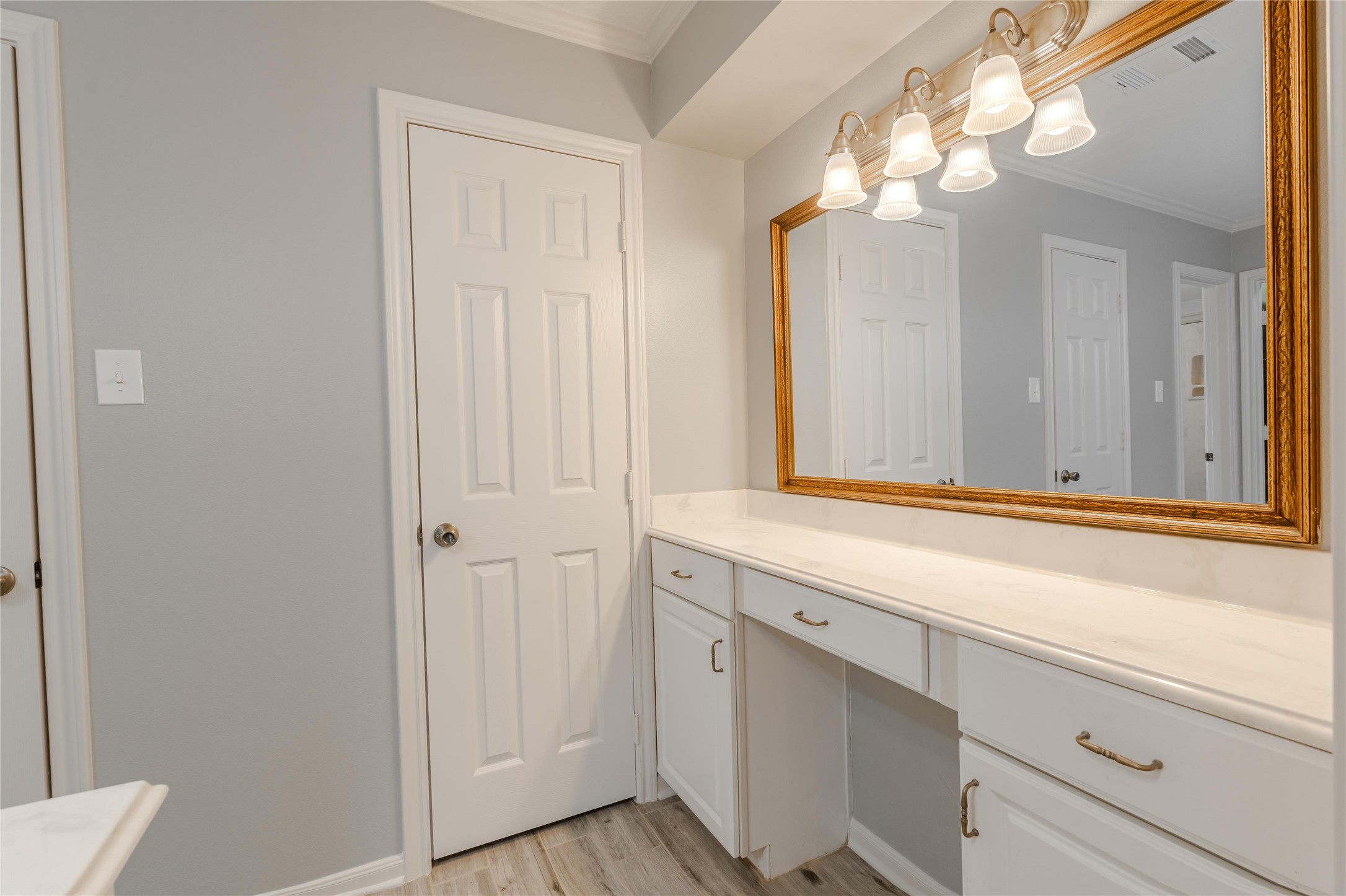 5938 Theall Road Houston, TX 77066 - Photo 19 of 35 a bathroom with a sink and a mirror