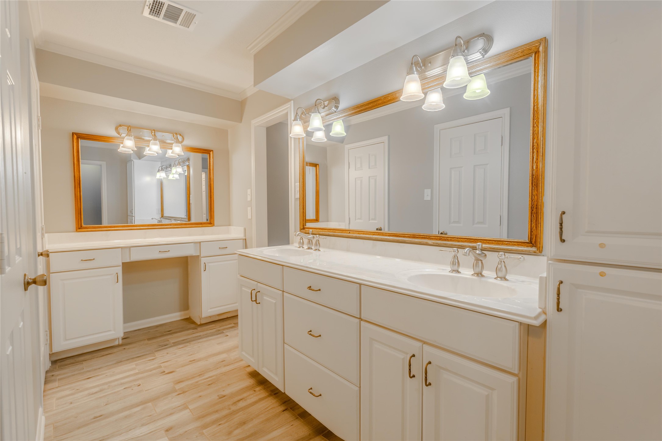 5938 Theall Road Houston, TX 77066 - Photo 21 of 35 a bathroom with a sink and a mirror