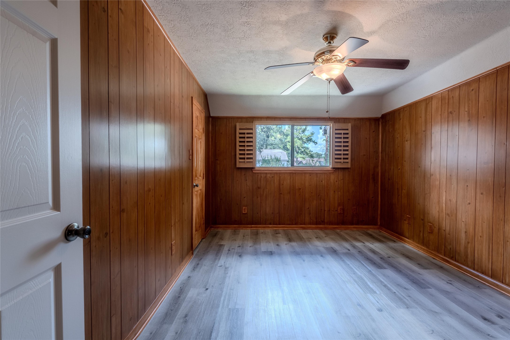 5938 Theall Road Houston, TX 77066 - Photo 30 of 35 wooden floor in an empty room with a window