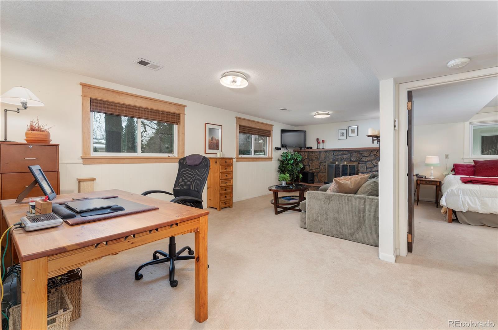 643 Furman Way Boulder, CO 80305 - Photo 16 of 25 a view of workspace with a window and couch