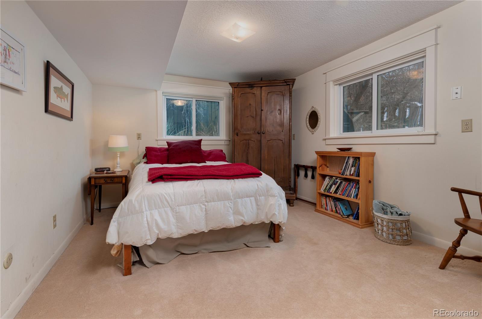 643 Furman Way Boulder, CO 80305 - Photo 17 of 25 a bed room with a bed and a chair