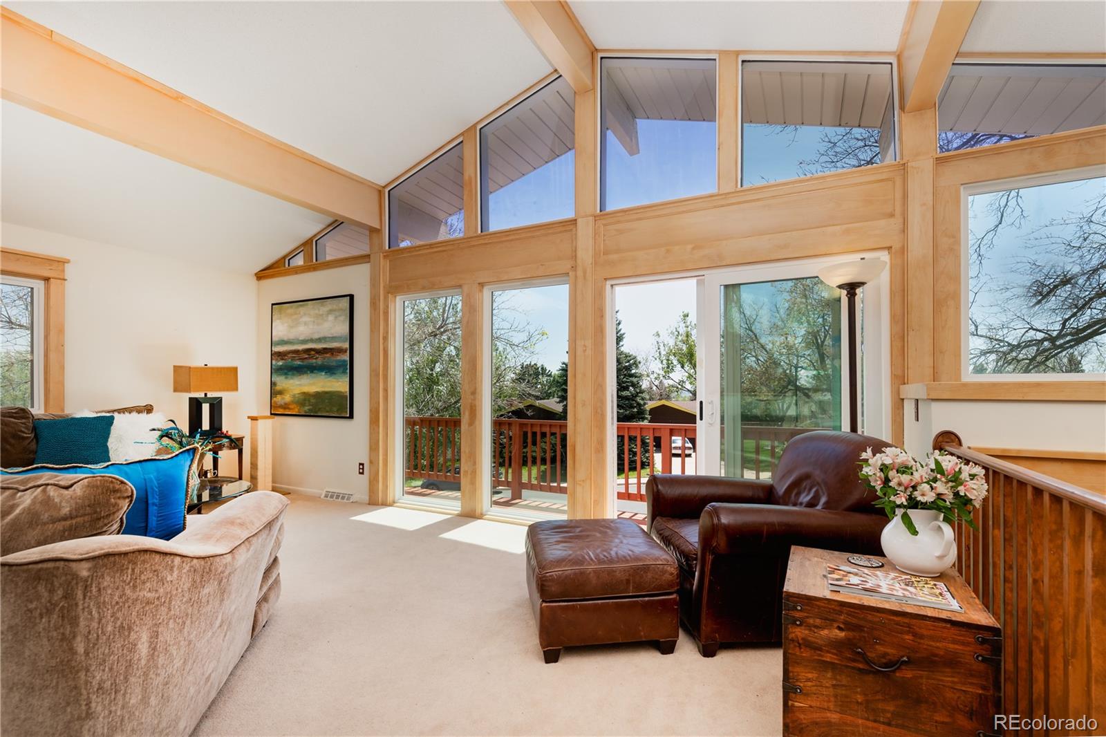 643 Furman Way Boulder, CO 80305 - Photo 3 of 25 a living room with furniture and a large window