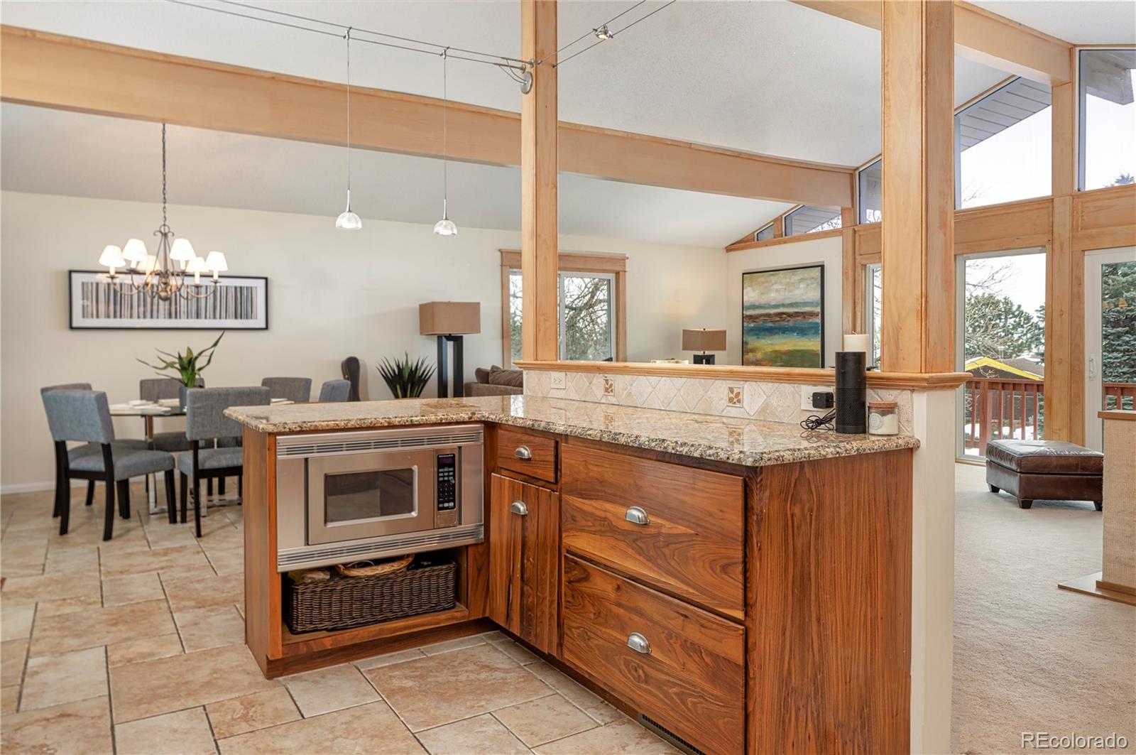 643 Furman Way Boulder, CO 80305 - Photo 7 of 25 a kitchen with a stove a sink and a refrigerator