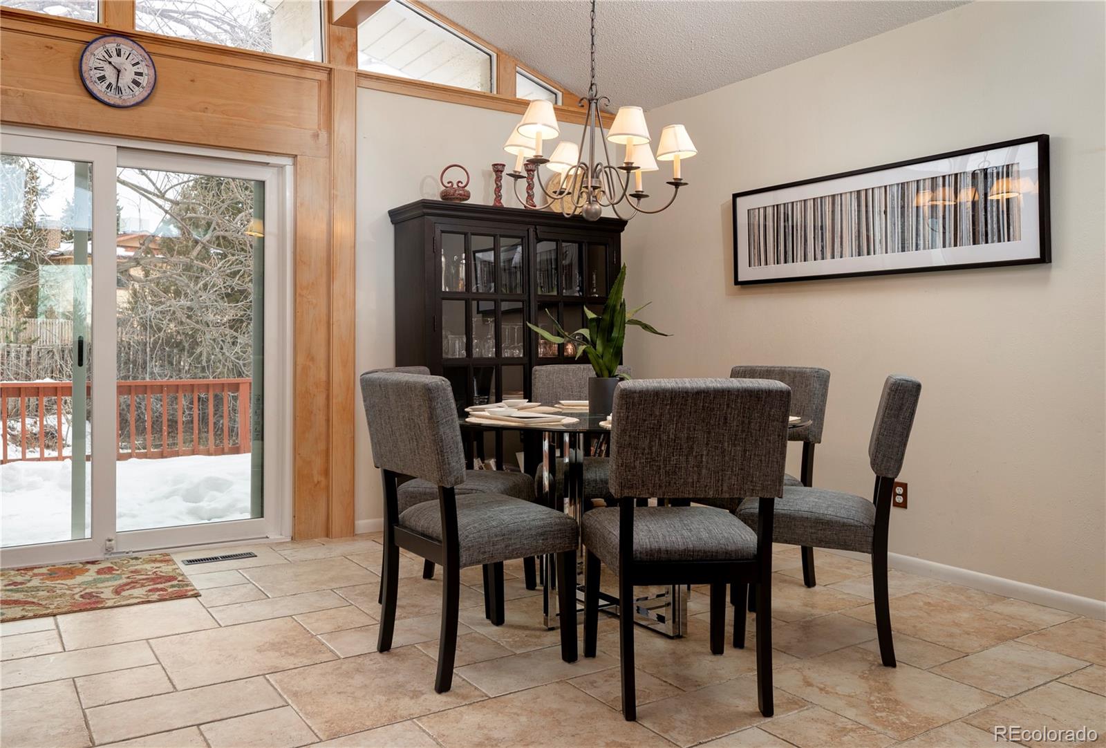 643 Furman Way Boulder, CO 80305 - Photo 8 of 25 a view of a dining room with furniture wooden floor and a chandelier