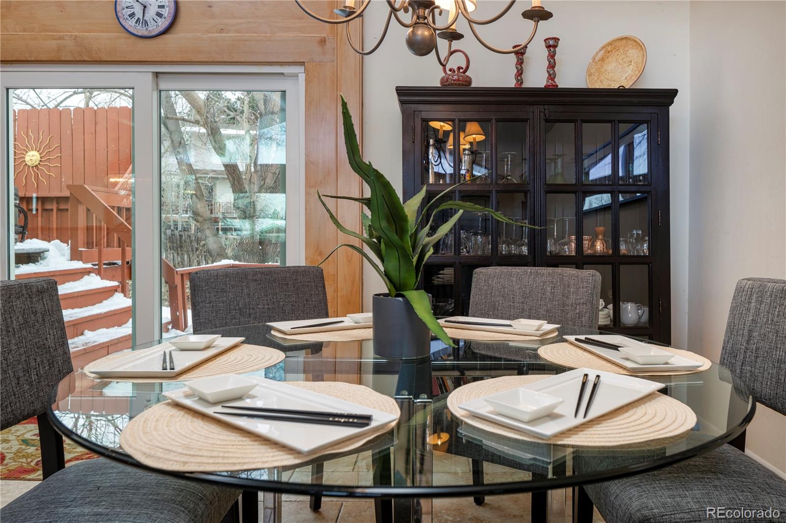 643 Furman Way Boulder, CO 80305 - Photo 9 of 25 a view of a dining room with furniture window and wooden floor