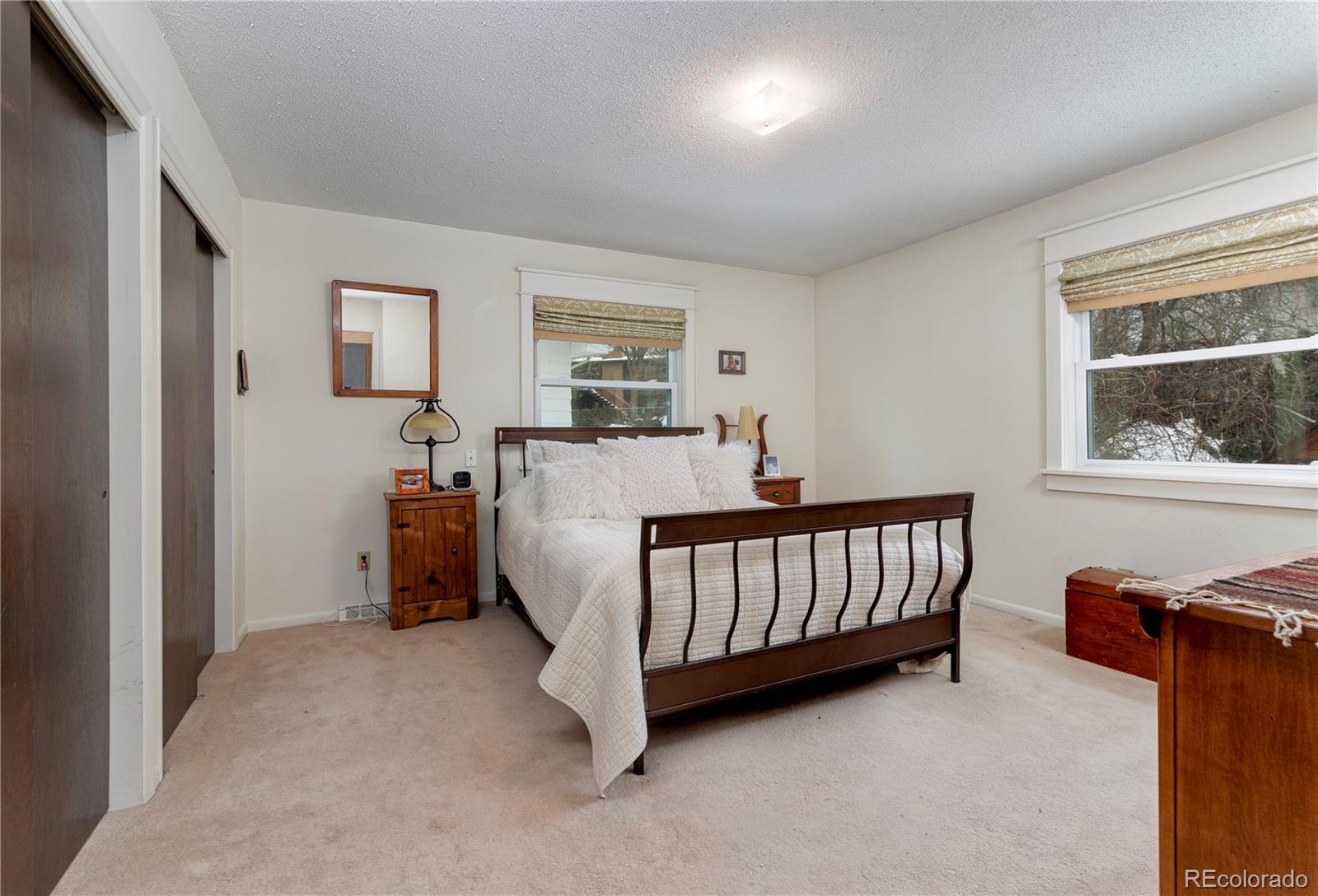 643 Furman Way Boulder, CO 80305 - Photo 10 of 25 a bedroom with furniture and windows