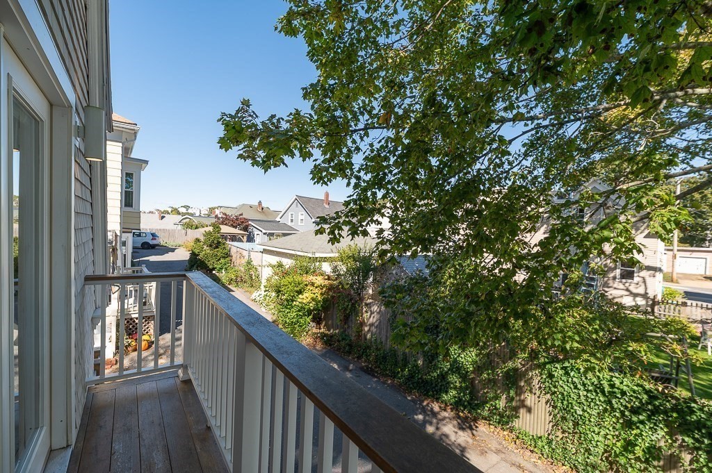 6 Prospect Court Gloucester, MA 01930 - Photo 21 of 26 a view of a balcony with wooden fence and floor