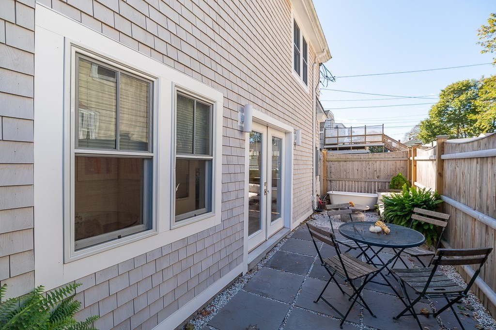 6 Prospect Court Gloucester, MA 01930 - Photo 24 of 26 a view of a house with backyard and sitting area