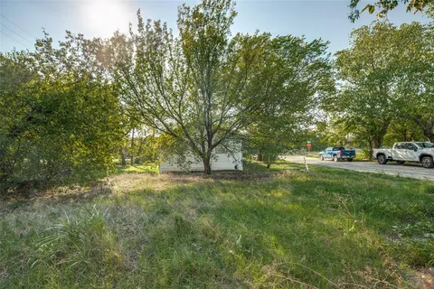 a view of outdoor space with deck and yard
