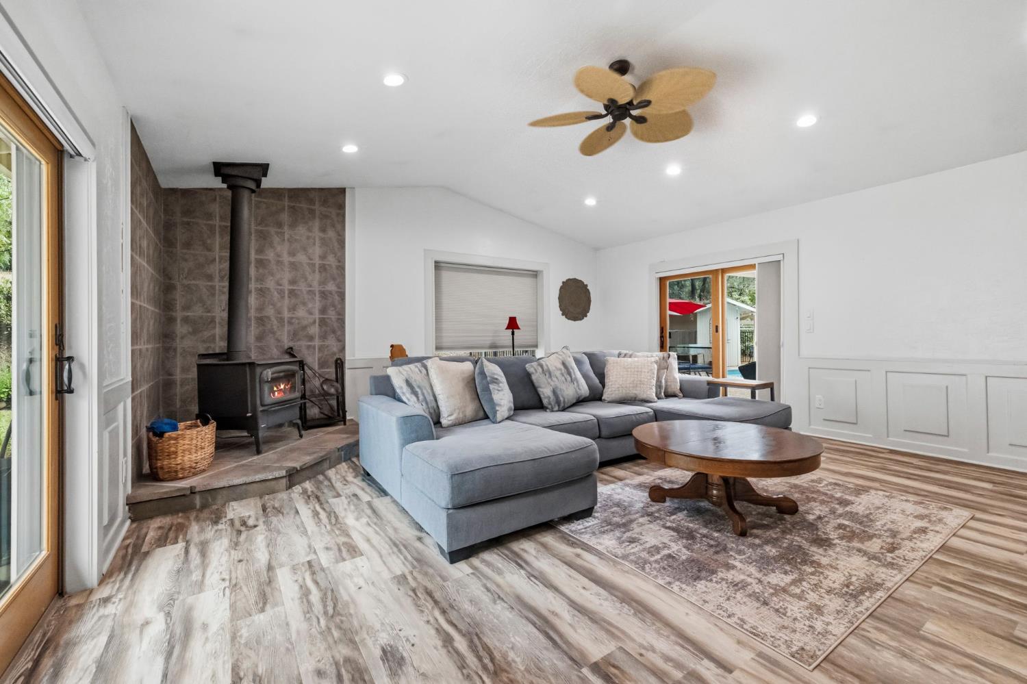 11460 Racetrack Road Sonora, CA 95370 - Photo 36 of 46 a living room with furniture and a wooden floor