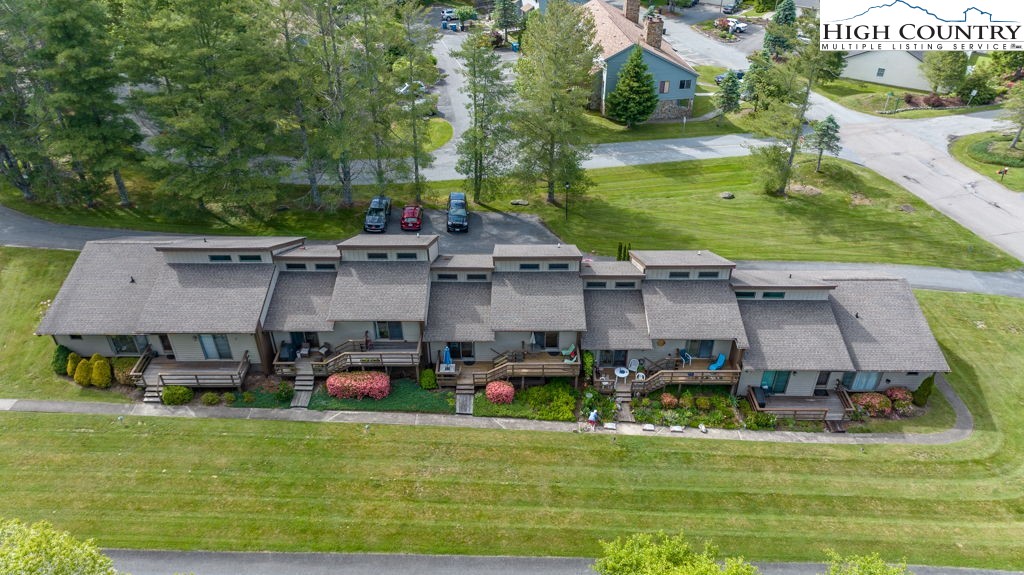 132 Juniper Drive, Unit 132 Boone, NC 28607 - Photo 33 of 36 an aerial view of a house with garden space and street view