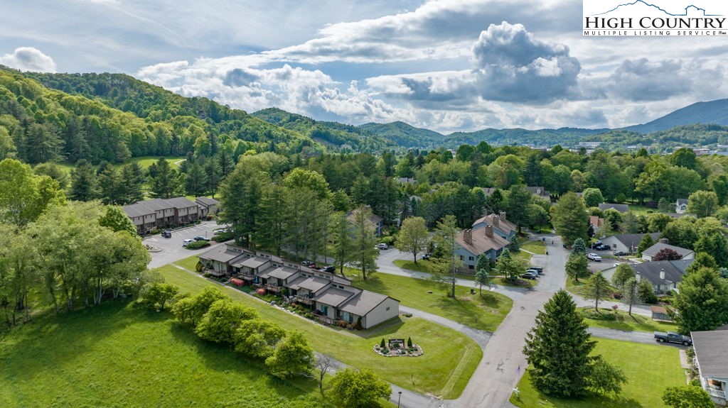 132 Juniper Drive, Unit 132 Boone, NC 28607 - Photo 34 of 36 a aerial view of a golf course with parking space