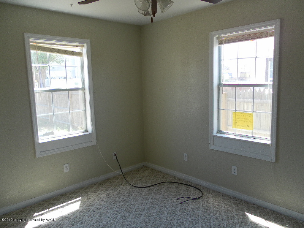 4313 South Polk Street Amarillo, TX 79110 - Photo 3 of 10 a room with a window