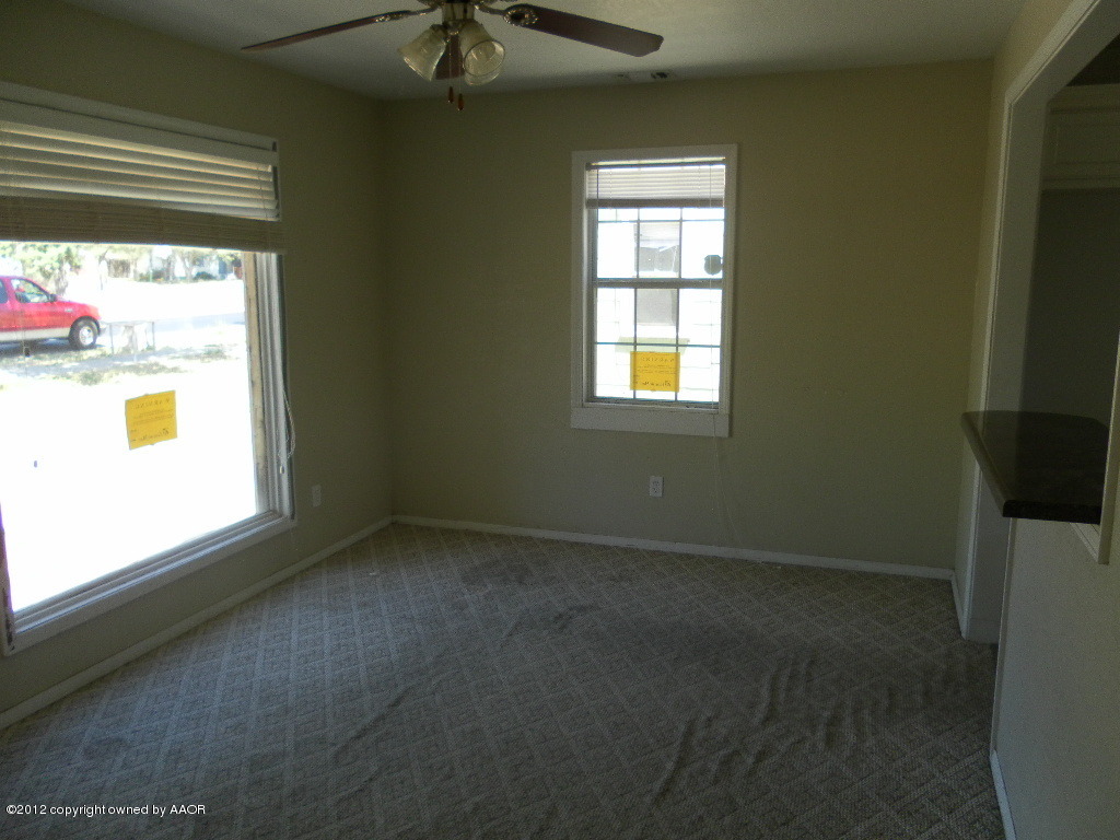 4313 South Polk Street Amarillo, TX 79110 - Photo 8 of 10 a view of an empty room with a window