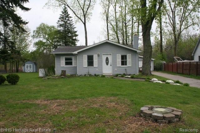 8399 Riverside Drive Brighton, MI 48116 - Photo 1 of 7 Front of House