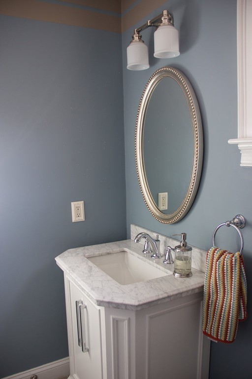 35 Lancaster County Road, Unit 5A Harvard, MA 01451 - Photo 8 of 20 a bathroom with a sink and a mirror