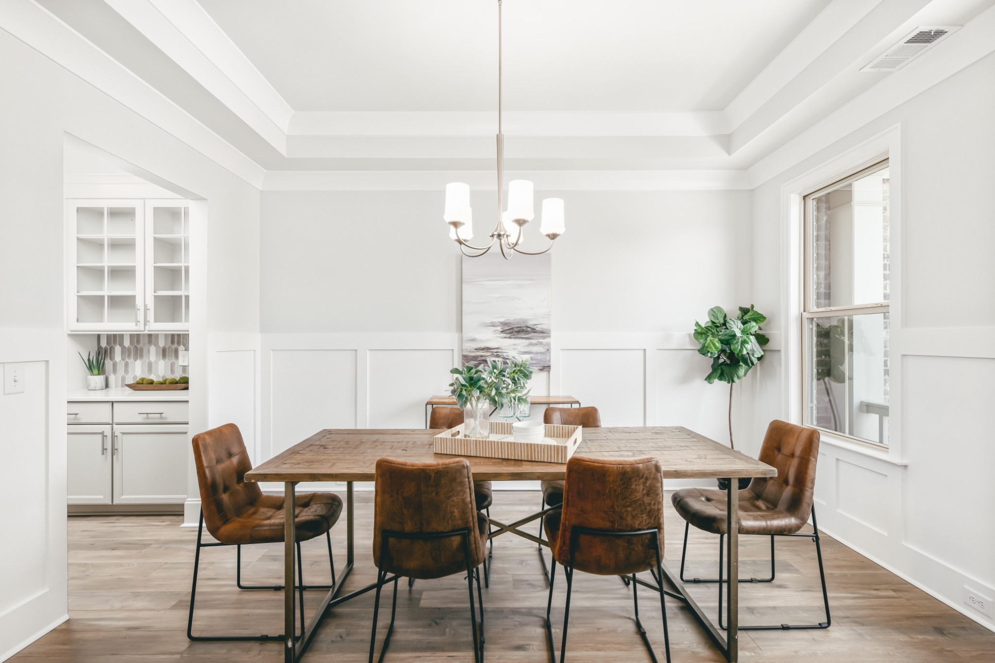 3238 Chase Point Drive Franklin, TN 37067 - Photo 12 of 29 a dining room with furniture a chandelier and wooden floor