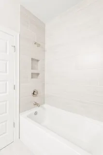a bathroom with a bathtub