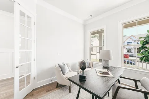 a workspace with furniture and window