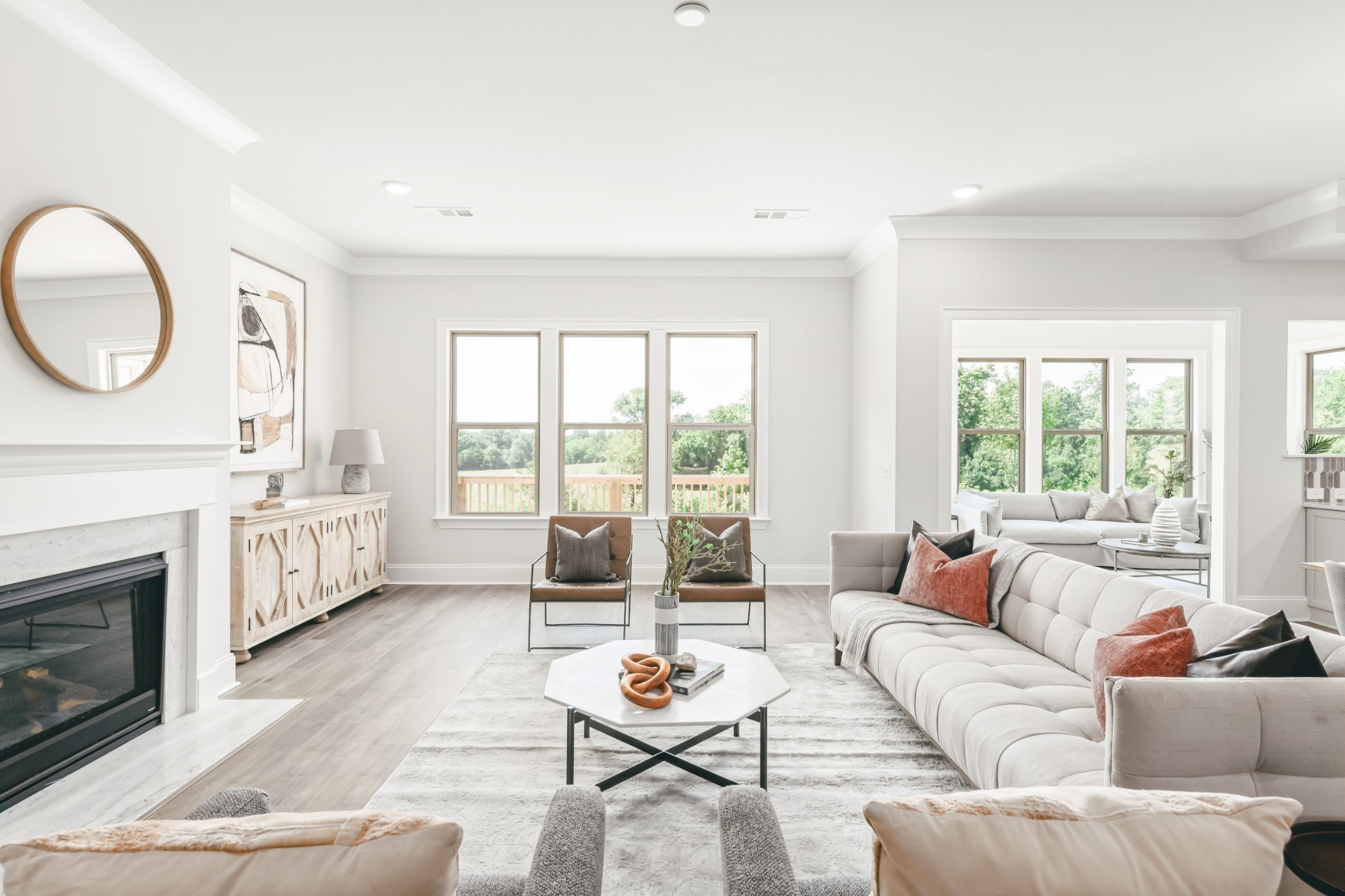 3238 Chase Point Drive Franklin, TN 37067 - Photo 8 of 29 a living room with furniture a fireplace and a large window