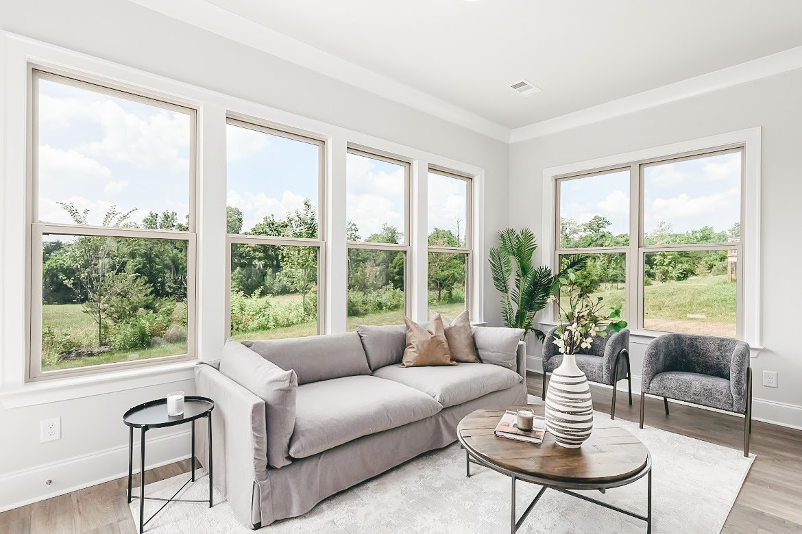 3238 Chase Point Drive Franklin, TN 37067 - Photo 9 of 29 a living room with furniture and a large window