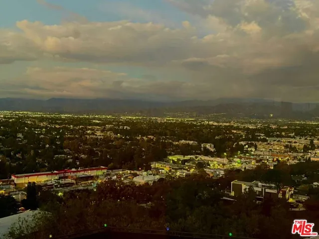 wooden view of city and mountain