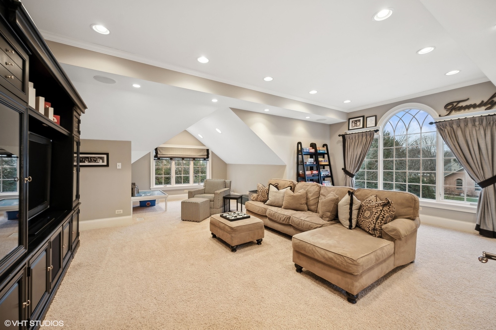 1251 Fiore Drive Lake Forest, IL 60045 - Photo 17 of 31 a living room with furniture fireplace and a flat screen tv