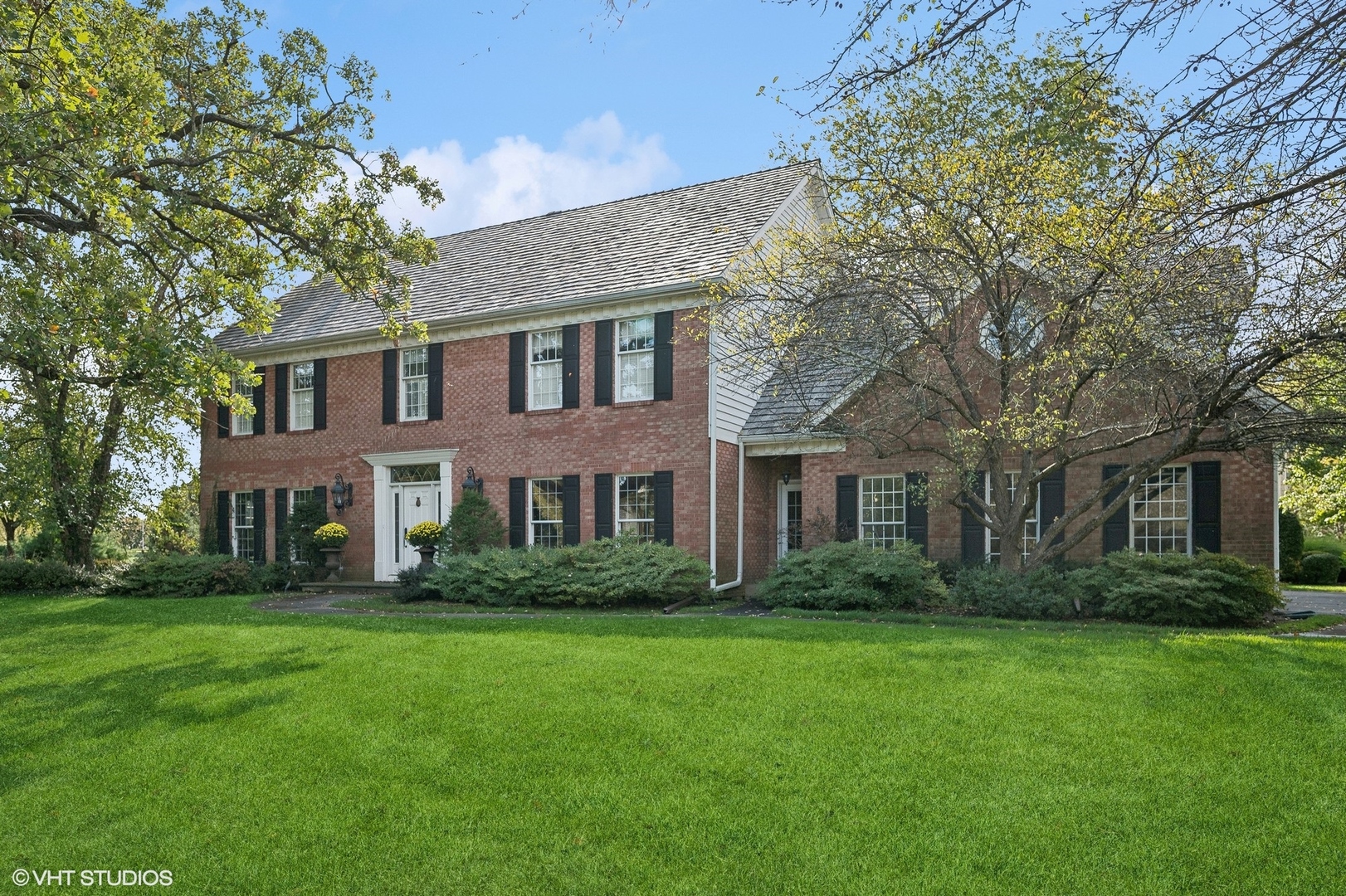 1251 Fiore Drive Lake Forest, IL 60045 - Photo 3 of 31 a front view of house with yard and green space