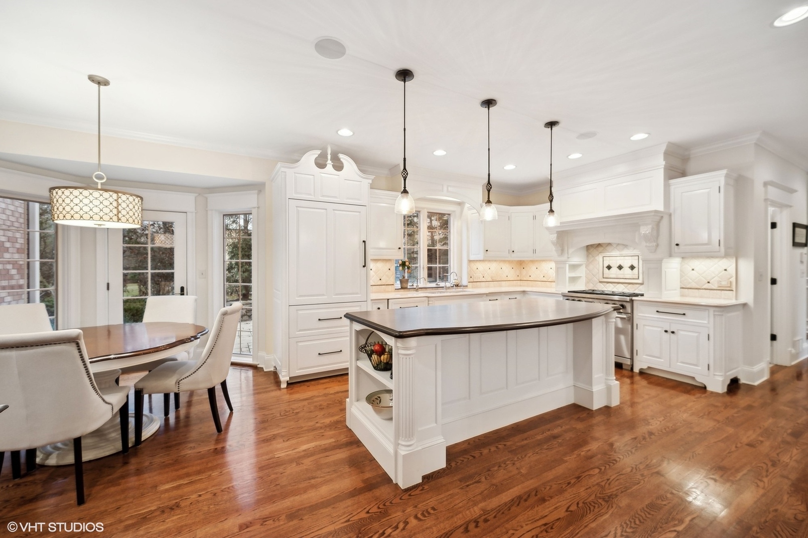 1251 Fiore Drive Lake Forest, IL 60045 - Photo 6 of 31 a kitchen with a table chairs stove and wooden floor