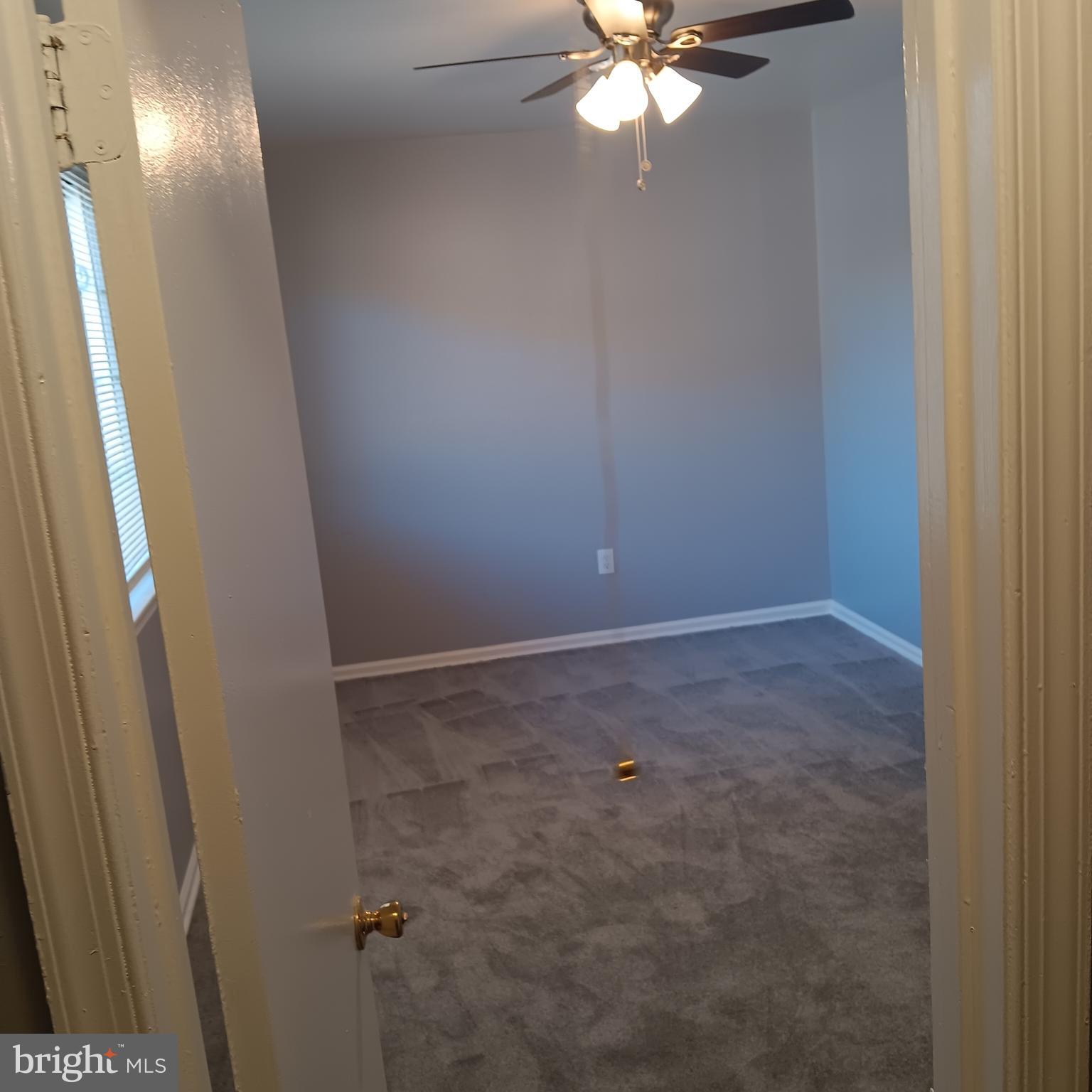 1971 Addison Road South District Heights, MD 20747 - Photo 16 of 30 a view of an empty room with wooden floor