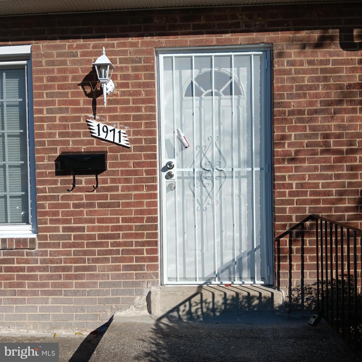 1971 Addison Road South District Heights, MD 20747 - Photo 2 of 30 a view of a door of the house