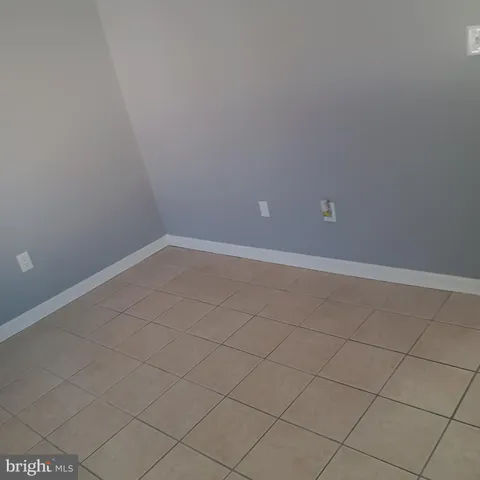 a view of a hallway with staircase