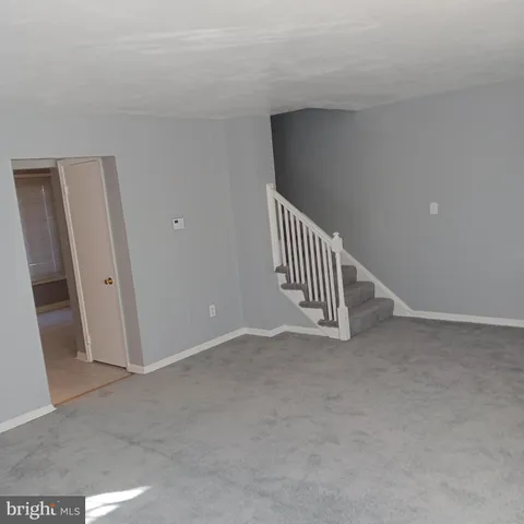 a bathroom with a toilet and a sink