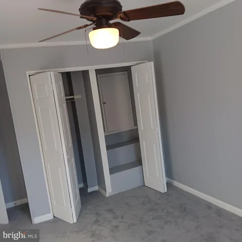 an empty room with wooden floor