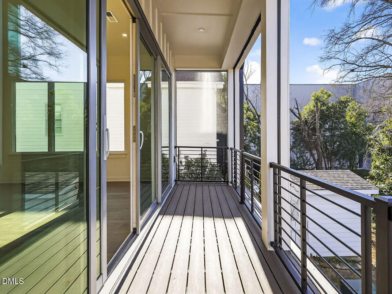1521 Sunrise Avenue Raleigh, NC 27608 - Photo 18 of 36 a view of balcony with wooden floor