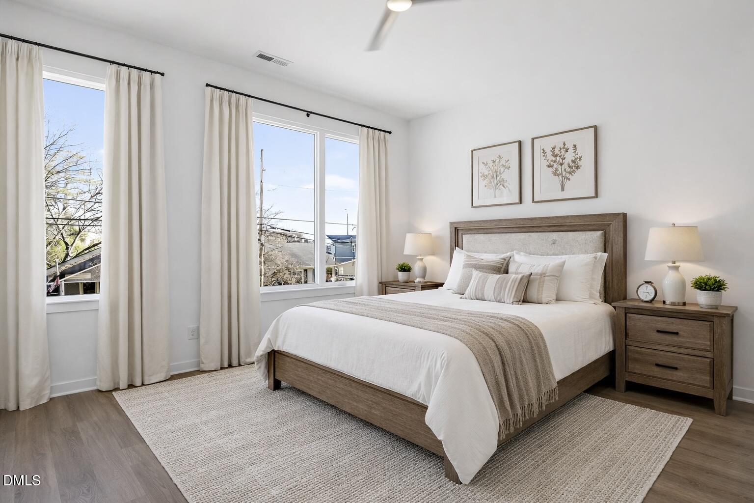 1521 Sunrise Avenue Raleigh, NC 27608 - Photo 22 of 36 a bed room with a bed and a window