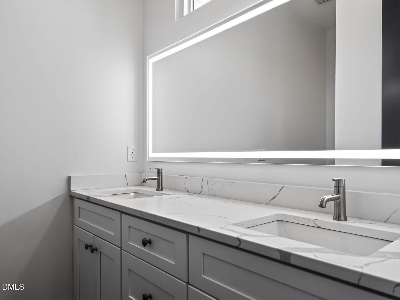 1521 Sunrise Avenue Raleigh, NC 27608 - Photo 24 of 36 a bathroom with a sink and a mirror
