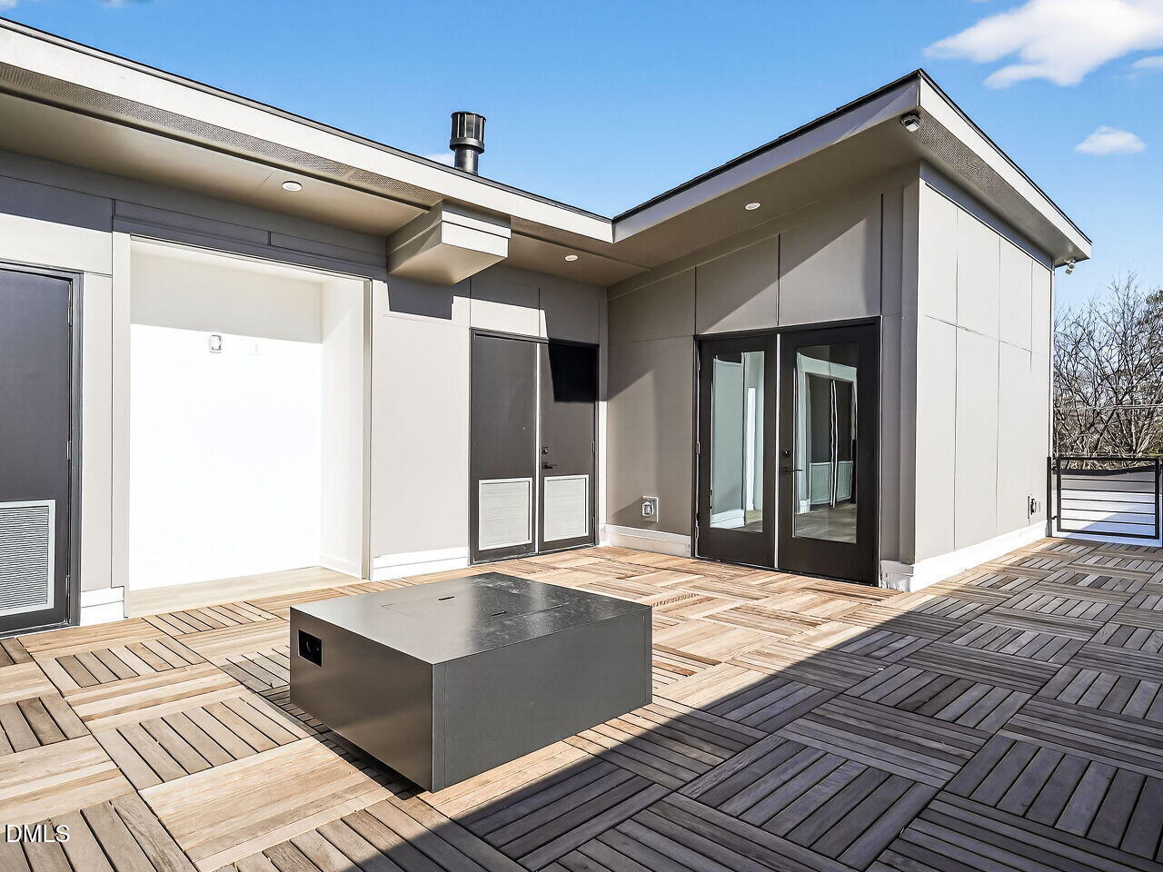 1521 Sunrise Avenue Raleigh, NC 27608 - Photo 30 of 36 a view of a balcony with a couch and wooden floor