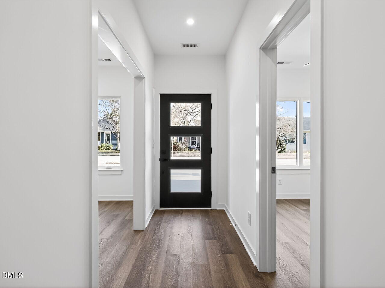 1521 Sunrise Avenue Raleigh, NC 27608 - Photo 5 of 36 wooden floor in a hall with an entryway