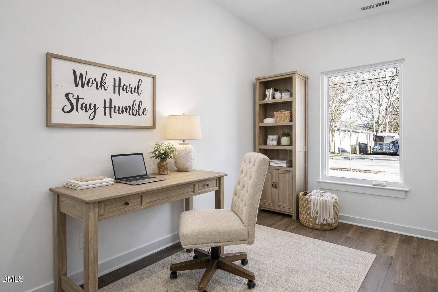 1521 Sunrise Avenue Raleigh, NC 27608 - Photo 6 of 36 a view of a workspace with furniture and a window