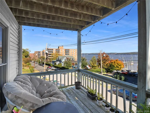 a view of a porch with furniture
